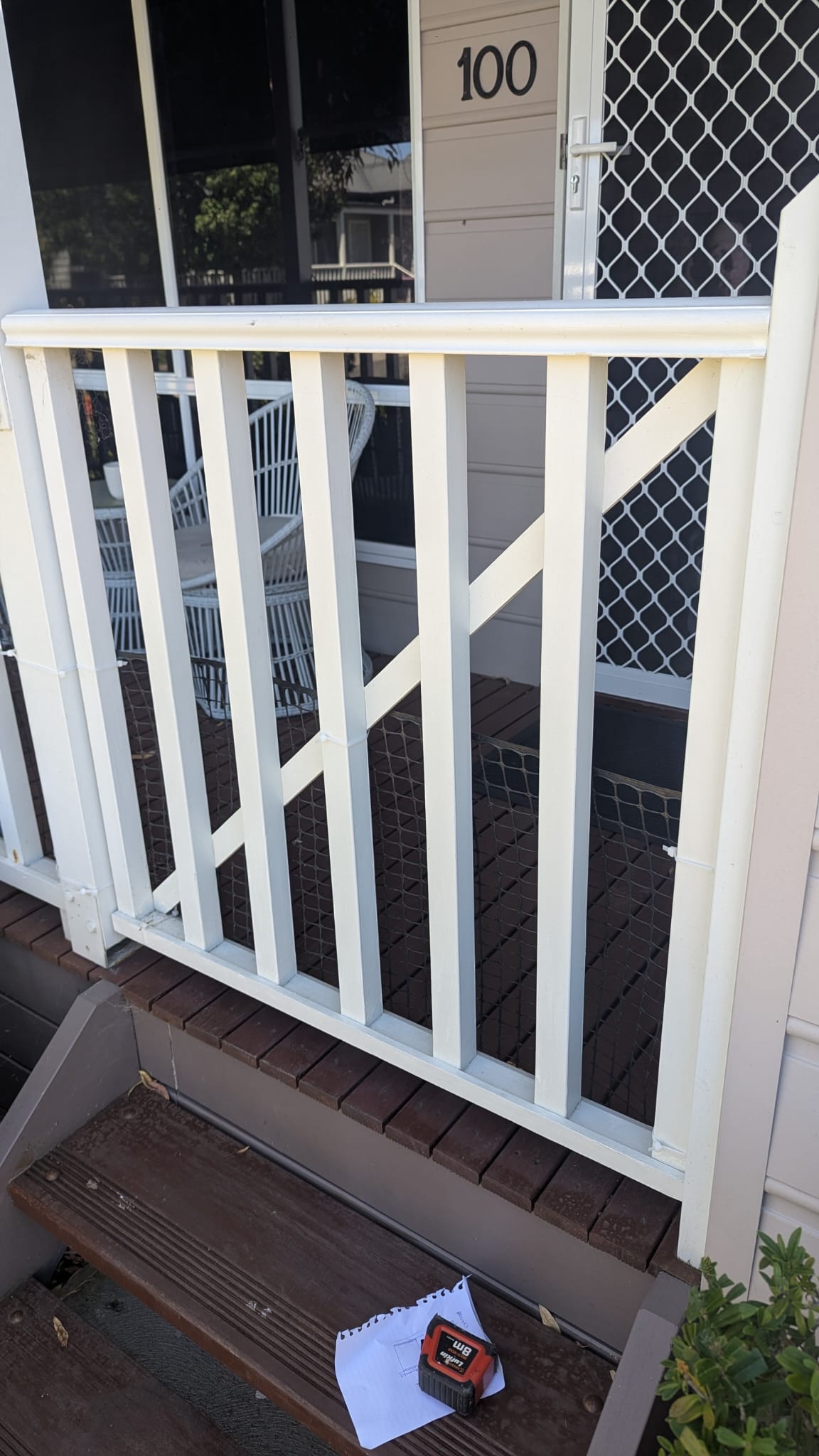 Custom balcony gate with mesh to keep dog in North Brisbane handyman