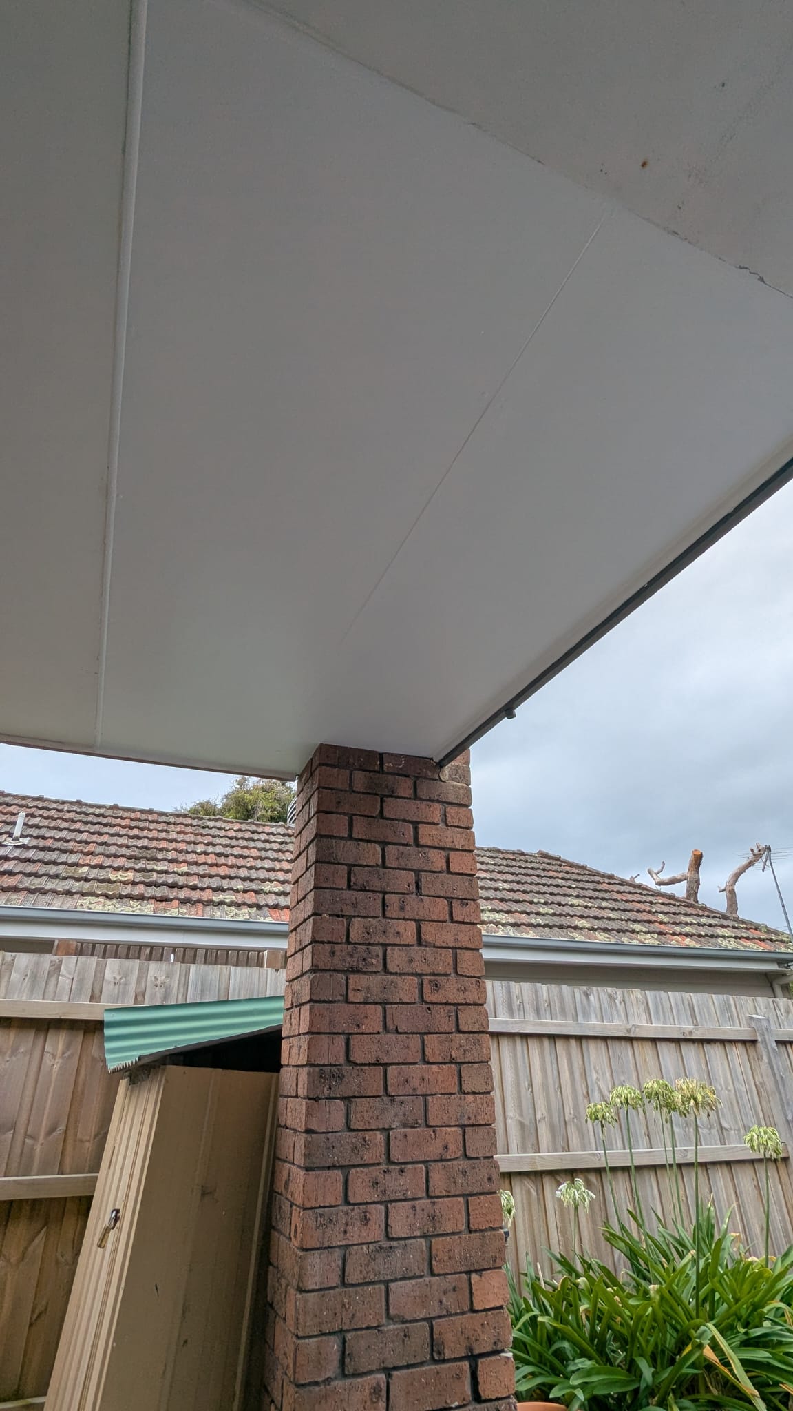 Carport cement sheet replaced and painted exterior white North Brisbane handyman