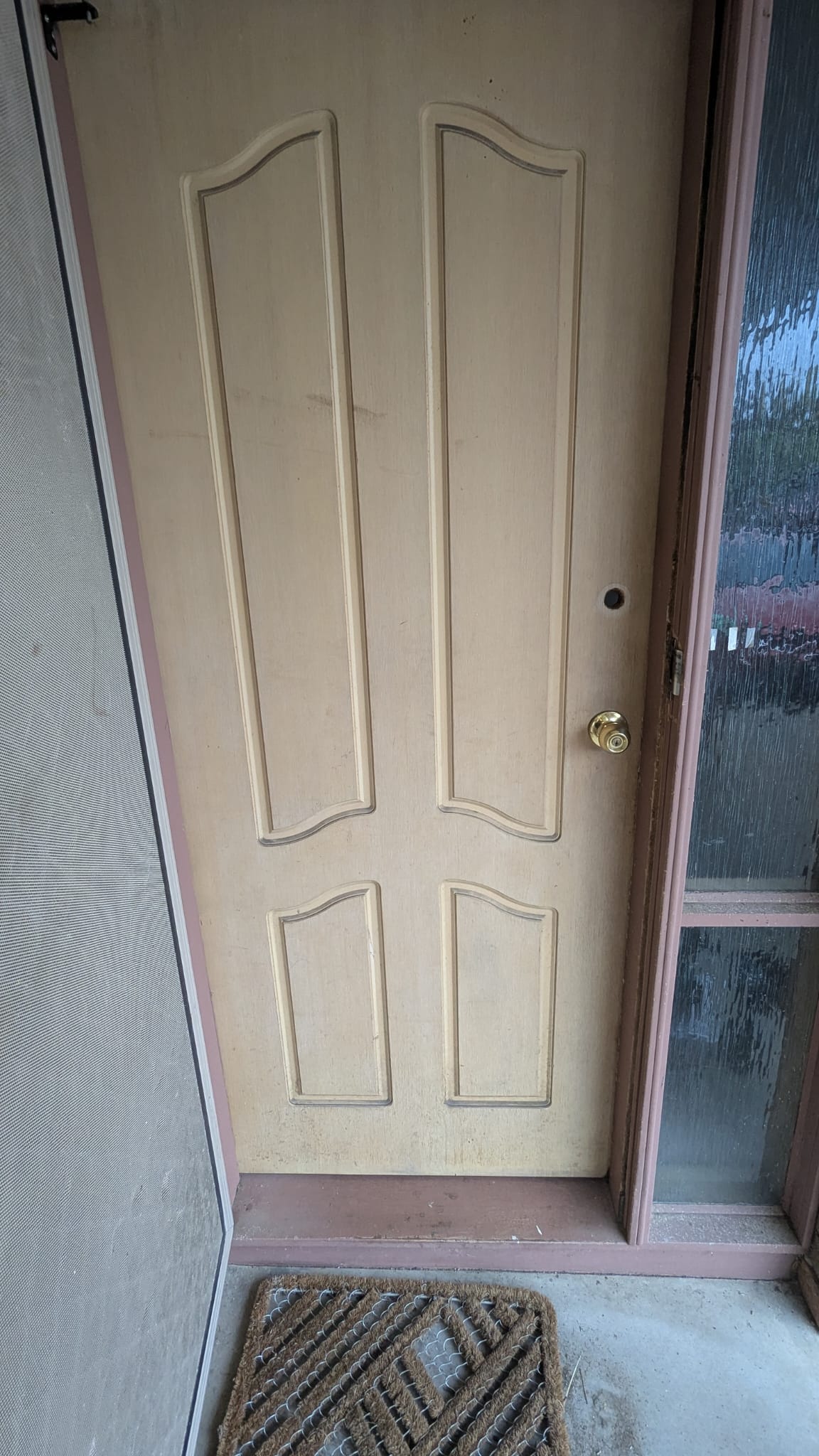 Old front door before hinge replacement deadlock and repaint North Brisbane general repairs