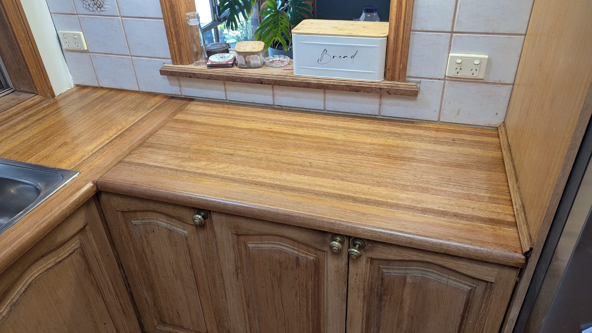 Kitchen benchtop restained 4 coats clear coat North Brisbane general repairs